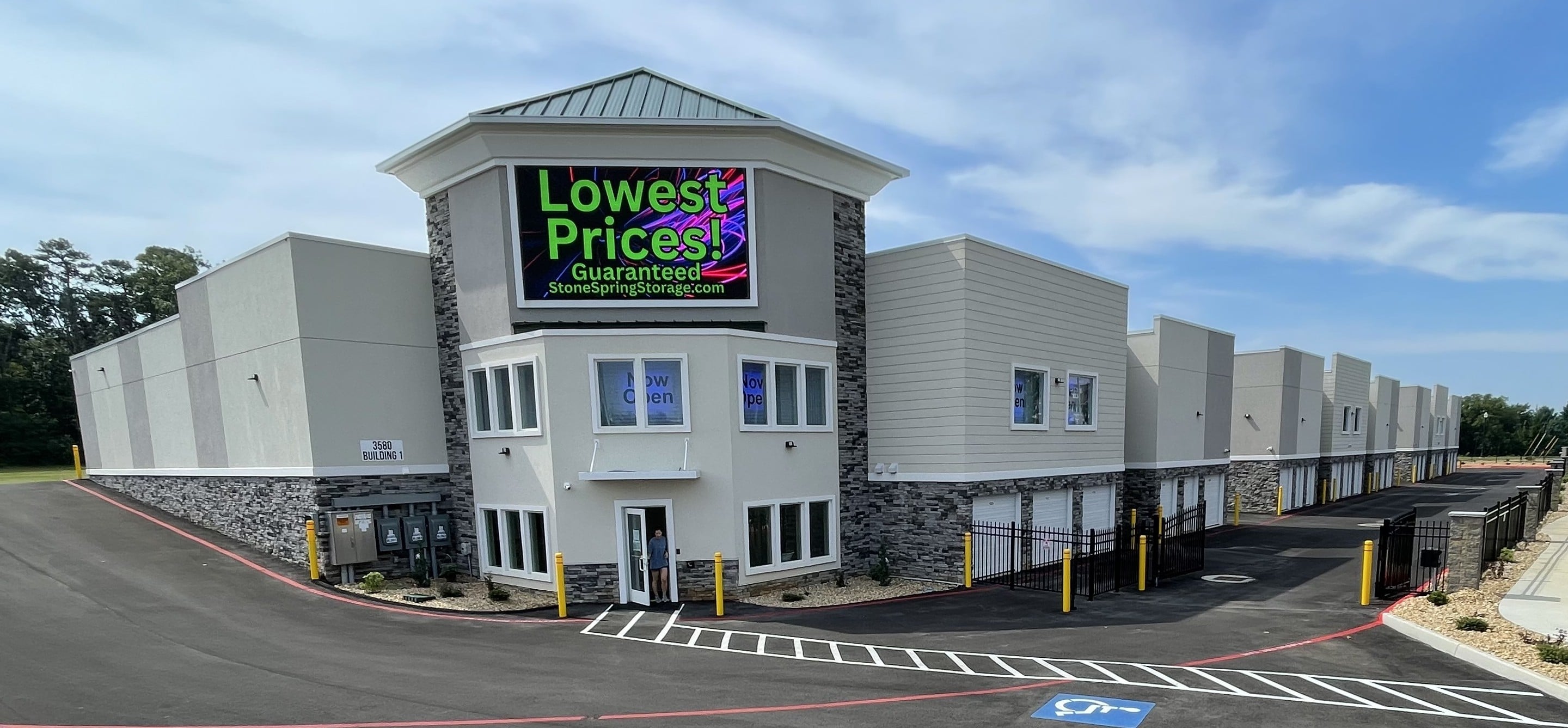 Stone Spring Storage exterior with the lowest-prices banner on the LED sign